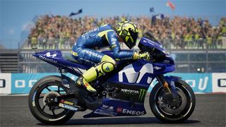 Best racing games - side view of racing motorcycle in motion