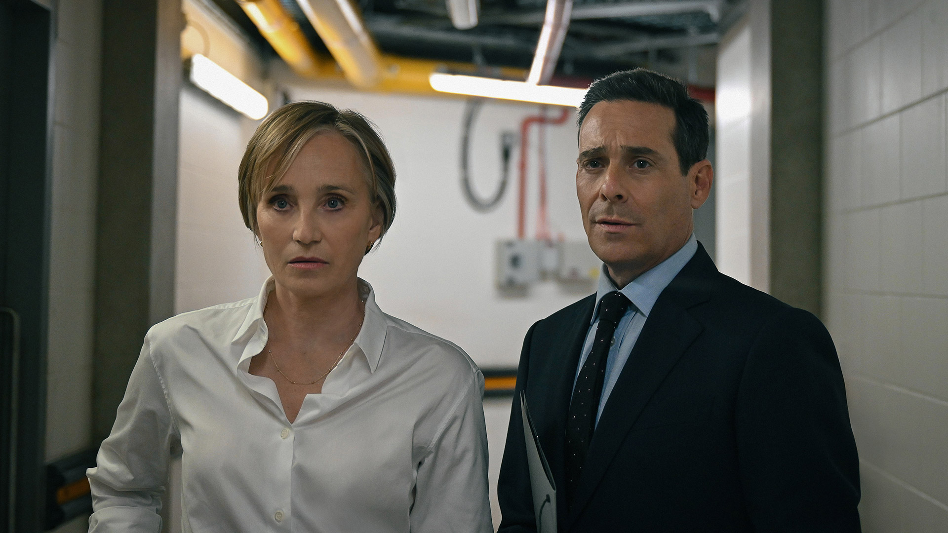 James Callis and Kristen Scott Thomas stand in a hallway in Slow Horses season 5 episode 5