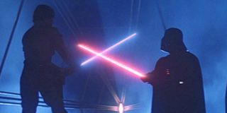 Luke Skywalker in a lightsaber duel with Darth Vader