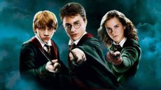 Ron, Harry, and Hermione point their wands at the camera in The Philosopher's Stone, one of the best Harry Potter movies