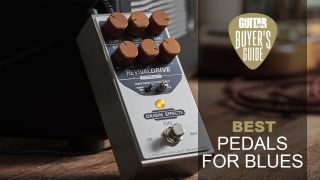 Origin Effects RevivalDrive Compact pedal leaning against an amp