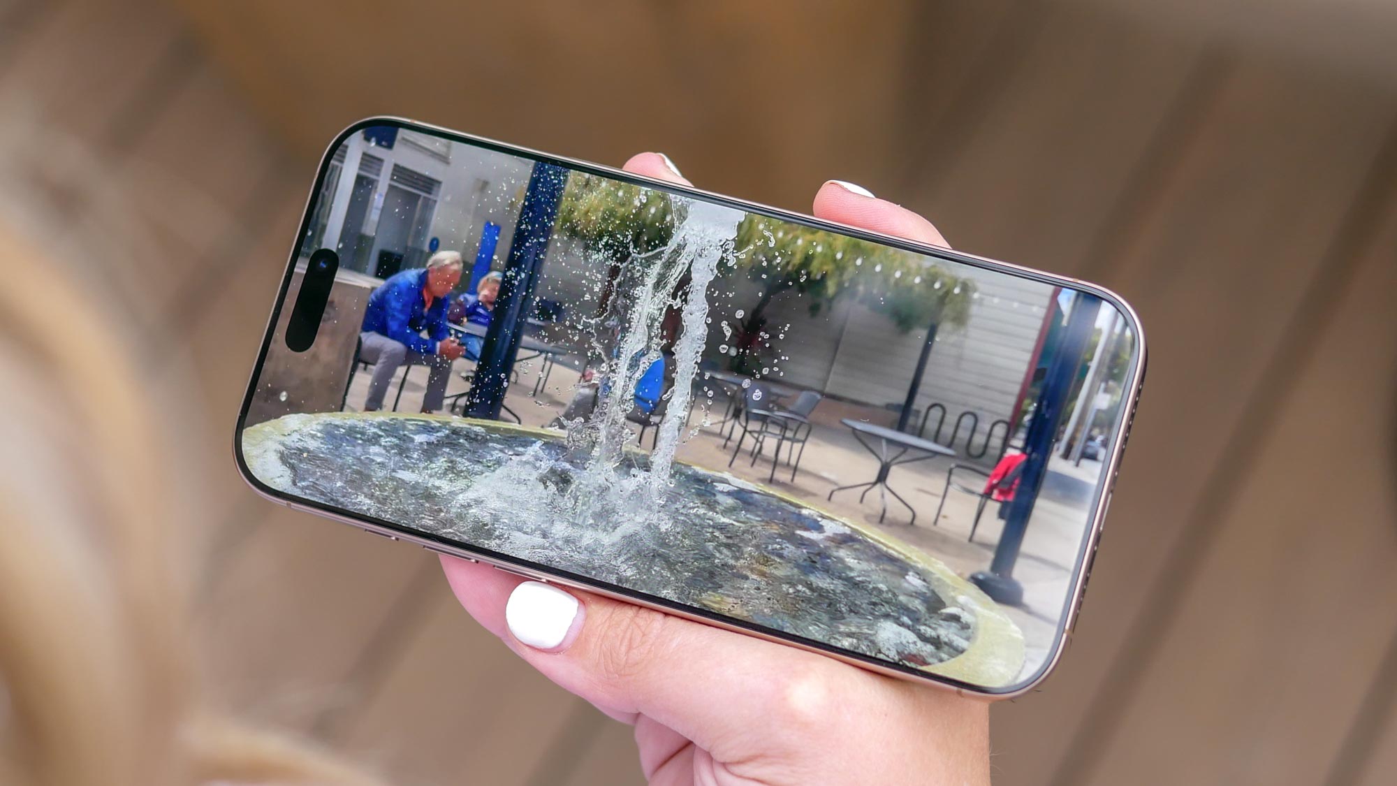 iPhone 16 Pro Max playing a video.