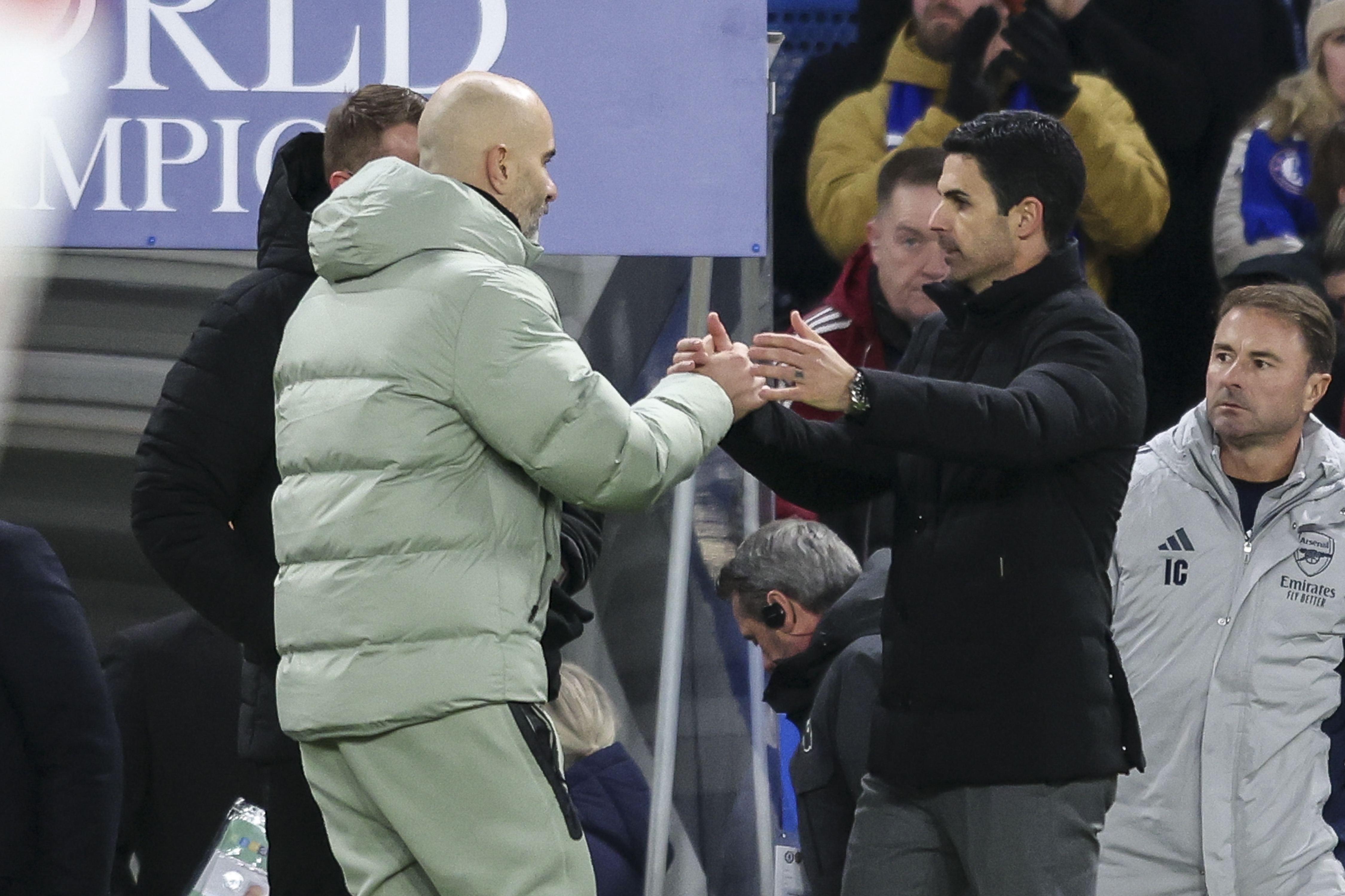 LONDON, ENGLAND - NOVEMBER 30: Head Coaches Enzo Maresca of Chelsea and Mikel Arteta of Arsenal at the end of their sides 1-1 draw during the Premier League match between Chelsea and Arsenal at Stamford Bridge on November 30, 2025 in London, England. (Photo by Robin Jones/Getty Images)