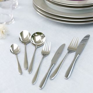 cutlery with spoons on stainless steel