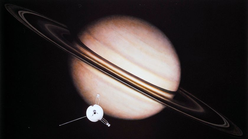 Artist&#039;s concept of a robotic spacecraft at a ringed planet