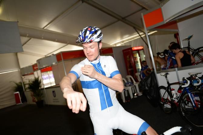 Jussi Veikkanen sorts his jersey out, before he goes training