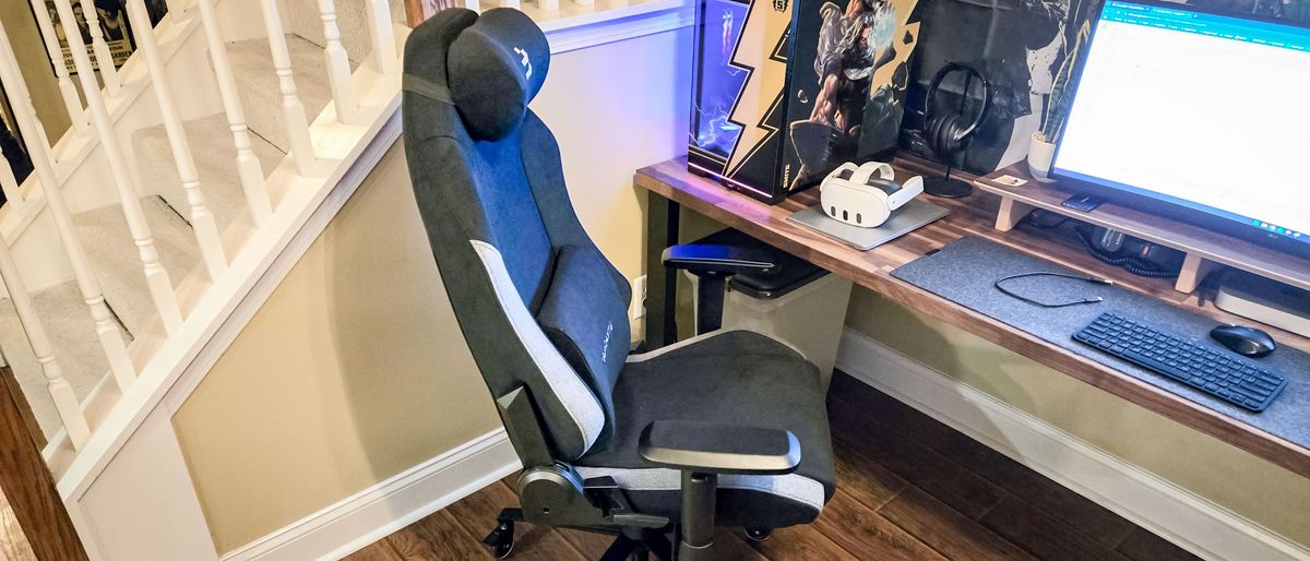 The Blacklyte Athena gaming chair in front of a desk