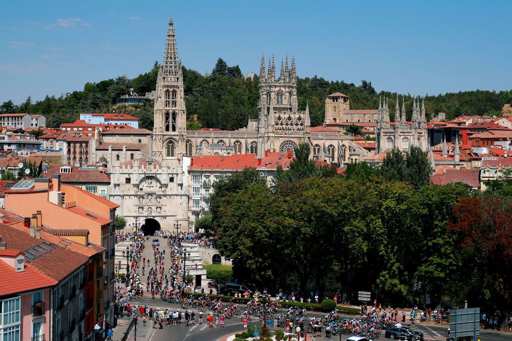 BURGOS SPAIN AUGUST 02 A general view of the peloton starting with the cathedral and the arch of Santa Mara in the city of Burgos during the 44th Vuelta a Burgos 2022 Stage 1 a 157km stage from Catedral de Burgos to Mirador del Castillo Burgos VueltaBurgos on August 02 2022 in Burgos Spain Photo by Gonzalo Arroyo MorenoGetty Images