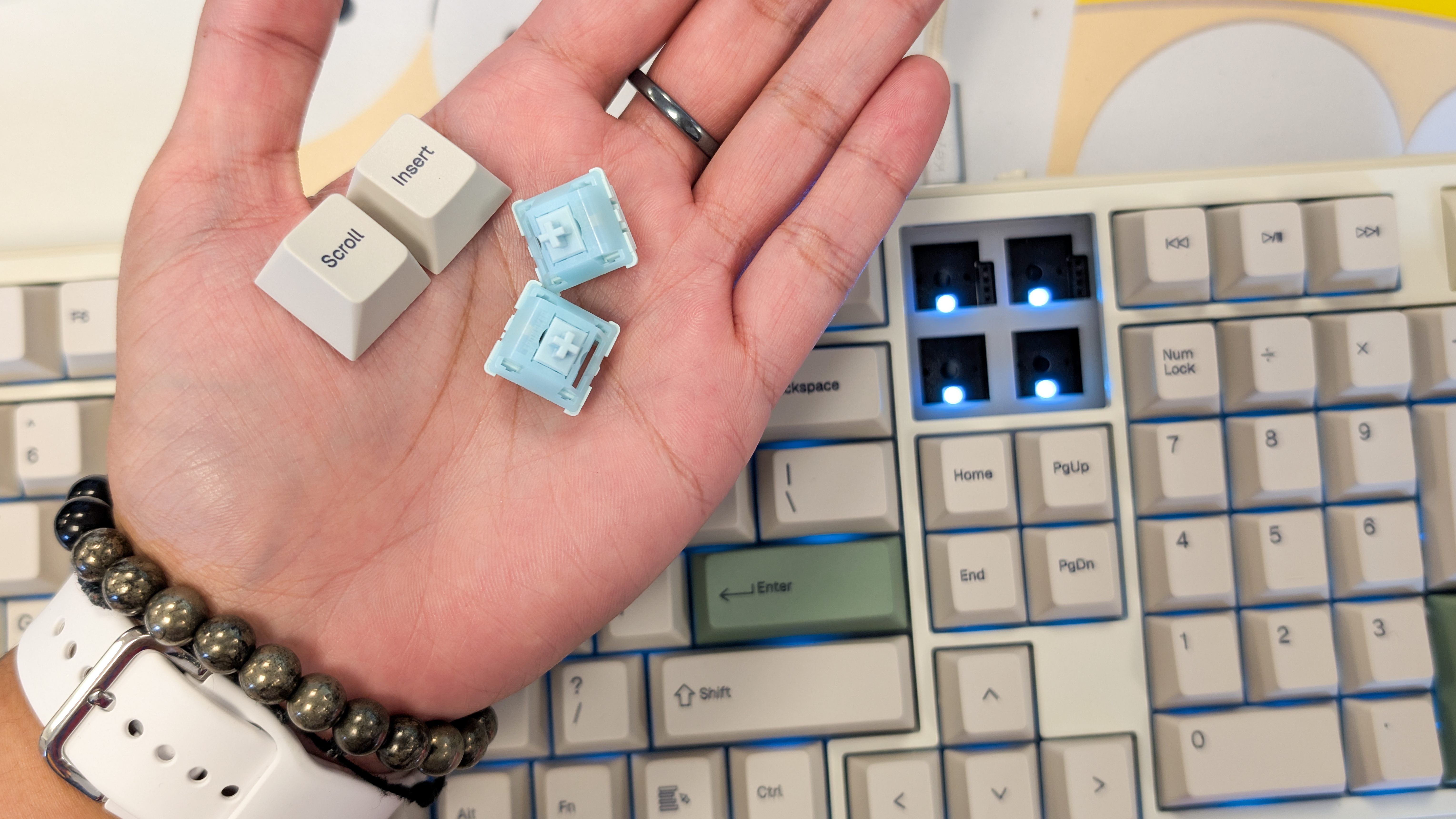 A white Epomaker RT100 Pro wireless mechanical keyboard