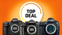 Three DSLR cameras: Nikon D850, Pentax K-1 II, and Canon EOS 5D Mark IV, with a &ldquo;Top Deal&rdquo; label on a vibrant orange background