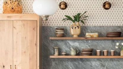 Wooden cabinets, grey marble kitchen work surface