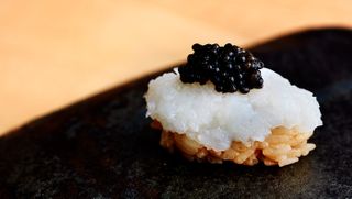 Squid and caviar nigiri at Maru