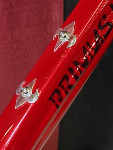Of course, simple rivnuts just wouldn't do this frame justice.
