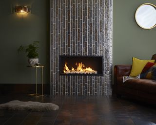 Boutique Metallic Copper Brick Slip Tiles on fireplace wall