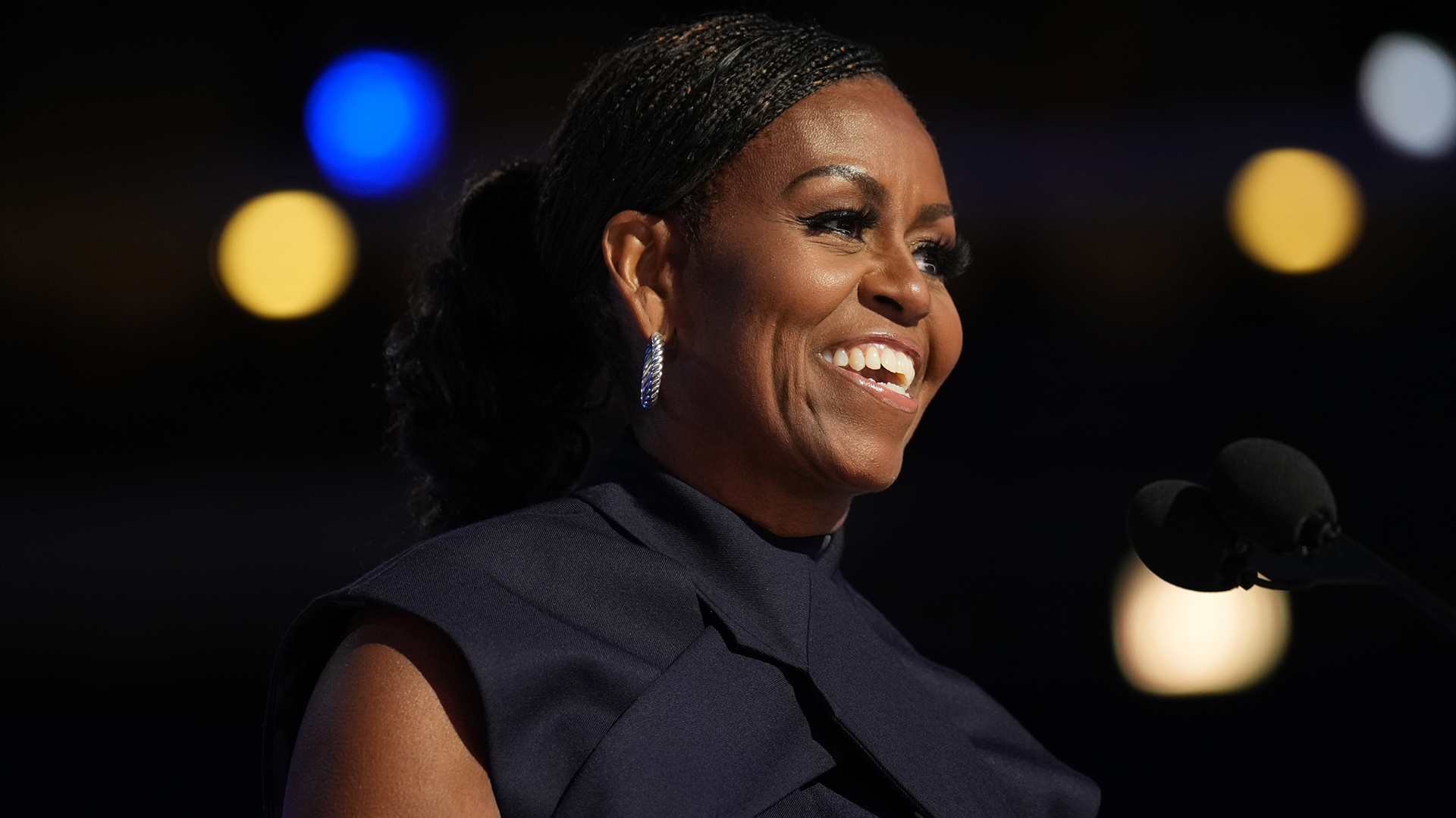 Michelle Obama attended a book tour event for &#039;The Look&#039; in a color-blocked Loewe Spring 2026 dress