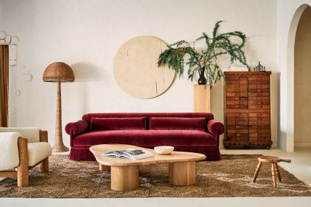 living room with a cherry pink sofa 