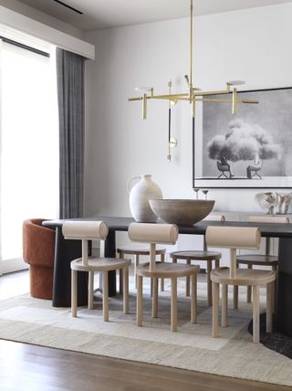 Neutral dining room with ceramic pots by Urbanology Designs