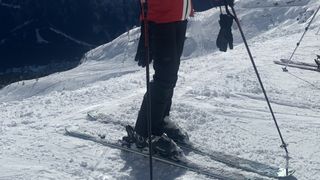 Skier's legs wearing the Helly Hansen Legendary ski pants