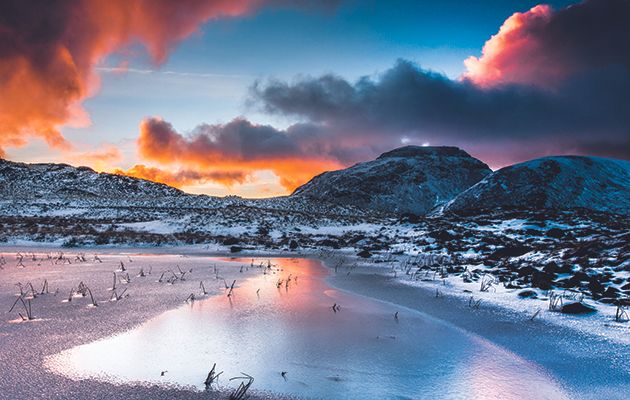 The dramatic landscape of England’s Lake District is stunning whether covered in snow or sprinkled with blossoms.