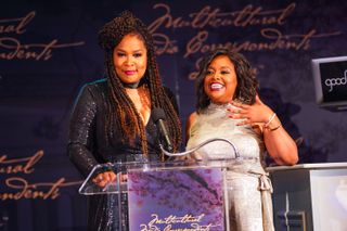 Kym Whitley (L) and Sherri Shephard hosting the 2019 Multicultural Media Correspondents Dinner 