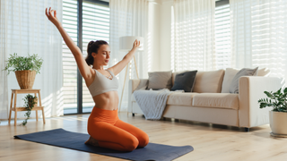 Woman doing low-intensity fitness at home