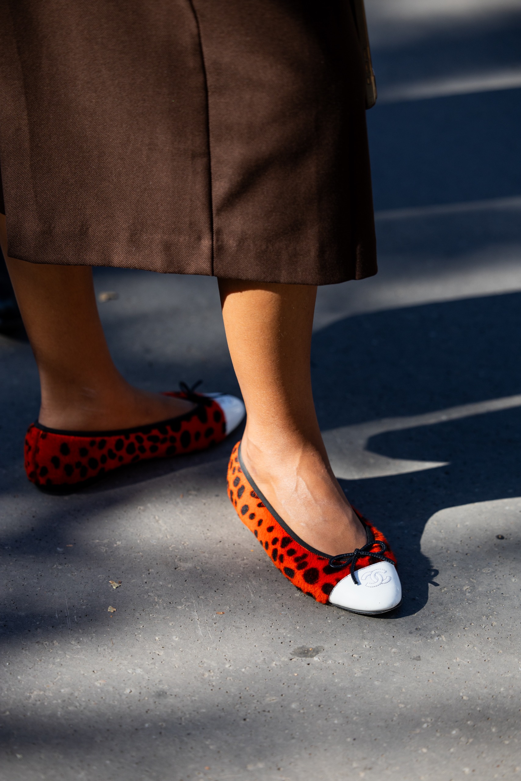 French girls are wearing ballet flats and Mary Janes at Paris Fashion Week