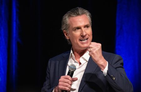 East Los Angeles, CA - February 26:Gov. Gavin Newsom speaks with Economic Development Corporation CEO Stephen Cheung at the 2025 Economic Forecast and Industry Outlook conference at East Los Angeles College on Wednesday, February 26, 2025.