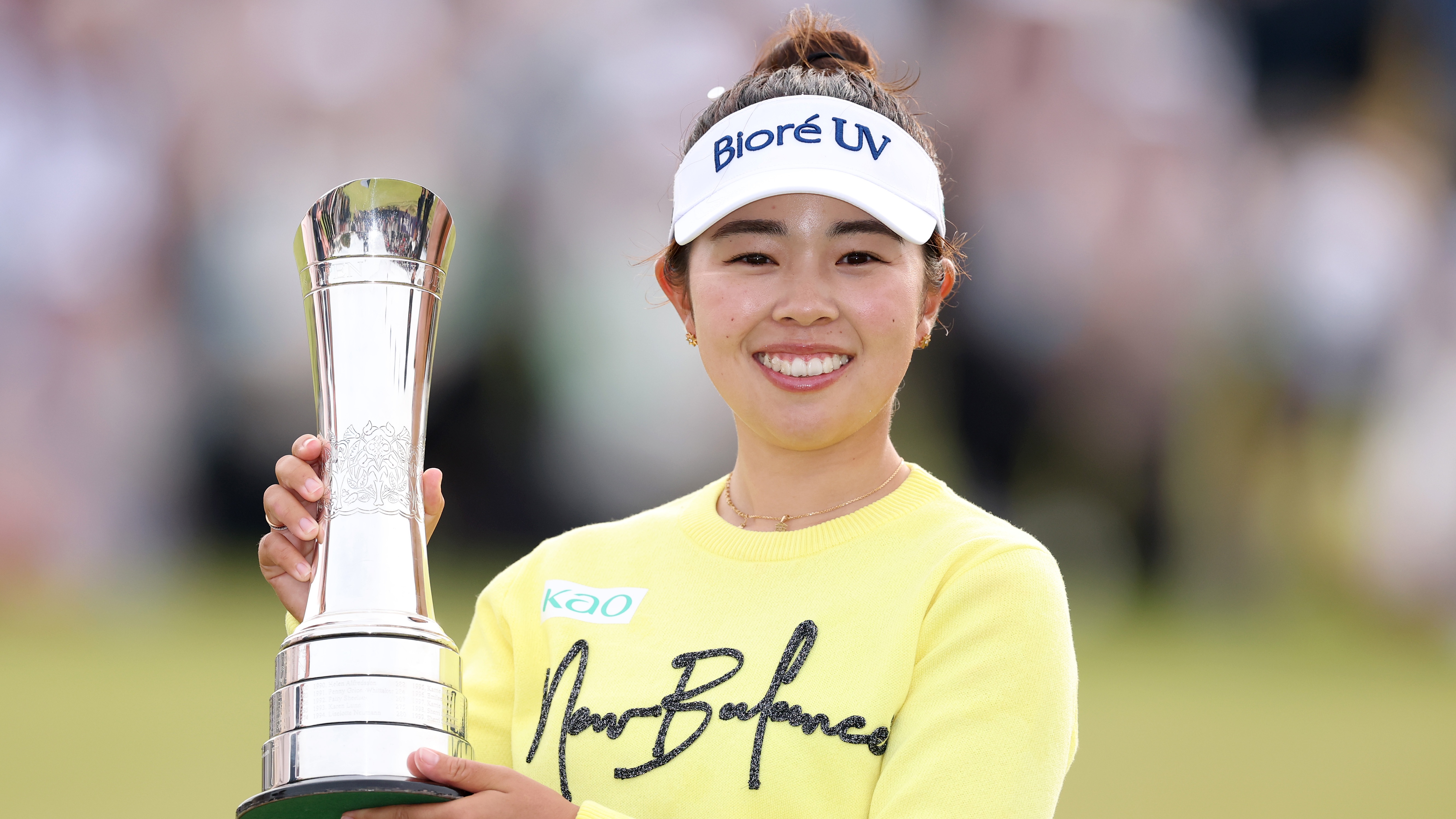 Miyu Yamashita of Japan poses for a photo with the trophy following the final round of the AIG Women's Open 2025 at Royal Porthcawl Golf Club on August 03, 2025 in Bridgend, Wales