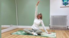 Kathryn Williams stretching while doing 20 minutes of yoga 