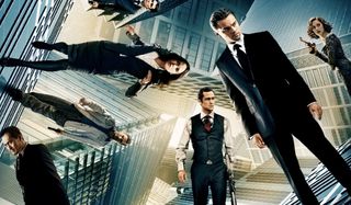 Inception the cast standing on a kaleidoscope of skyscrapers