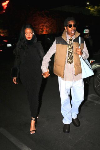 A photo of A$AP Rocky wearing the same light blue Bottega Intrecciato bag on a Dec. 17 date with Rihanna in Los Angeles.