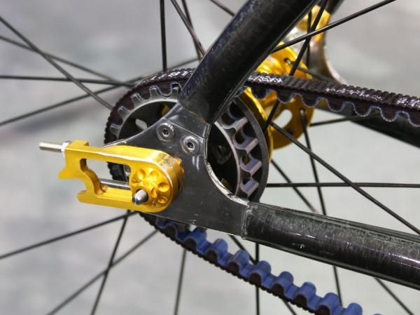 A split dropout is required to slip the belt into the rear triangle.