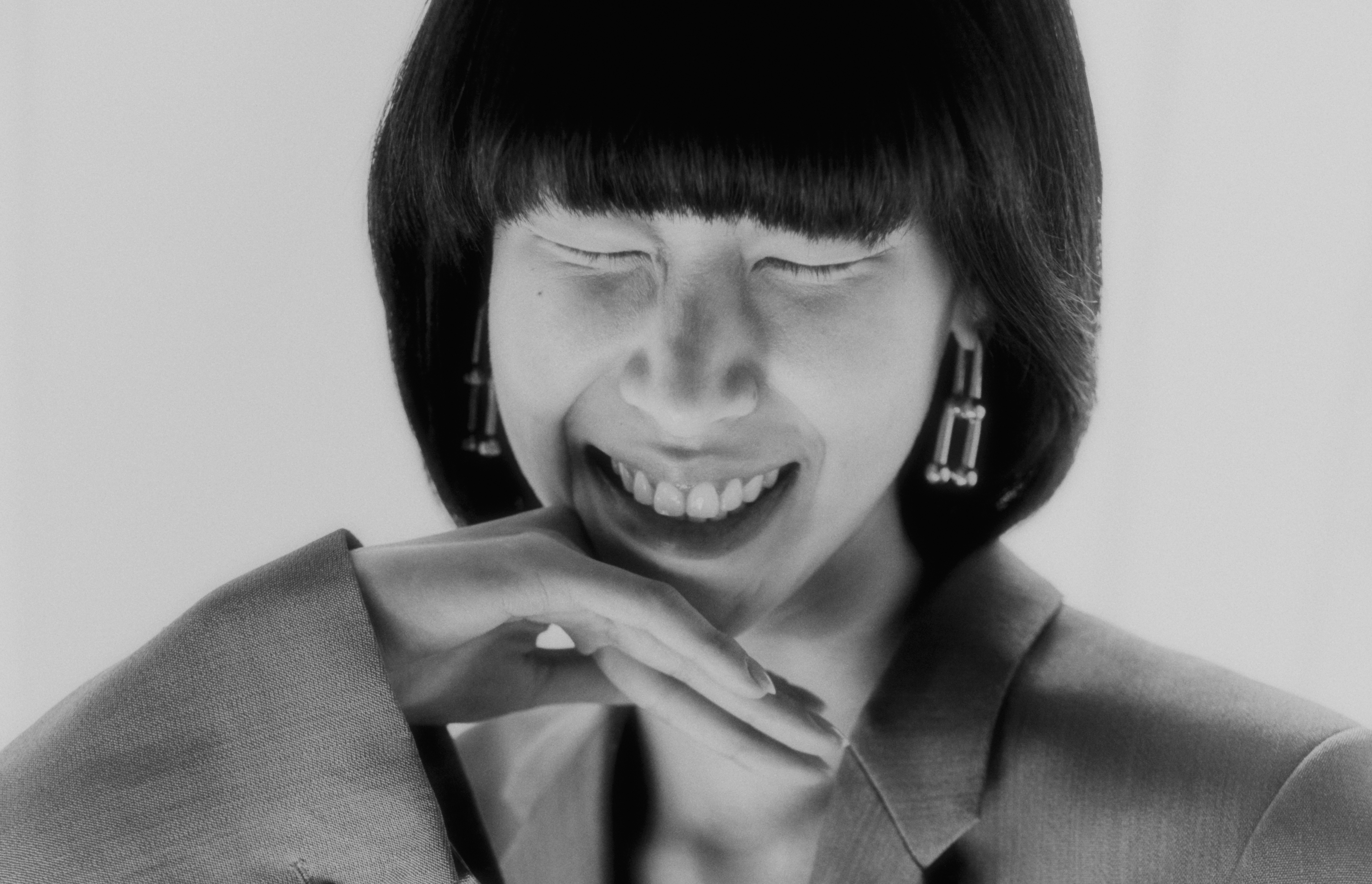 Still of model showing her teeth