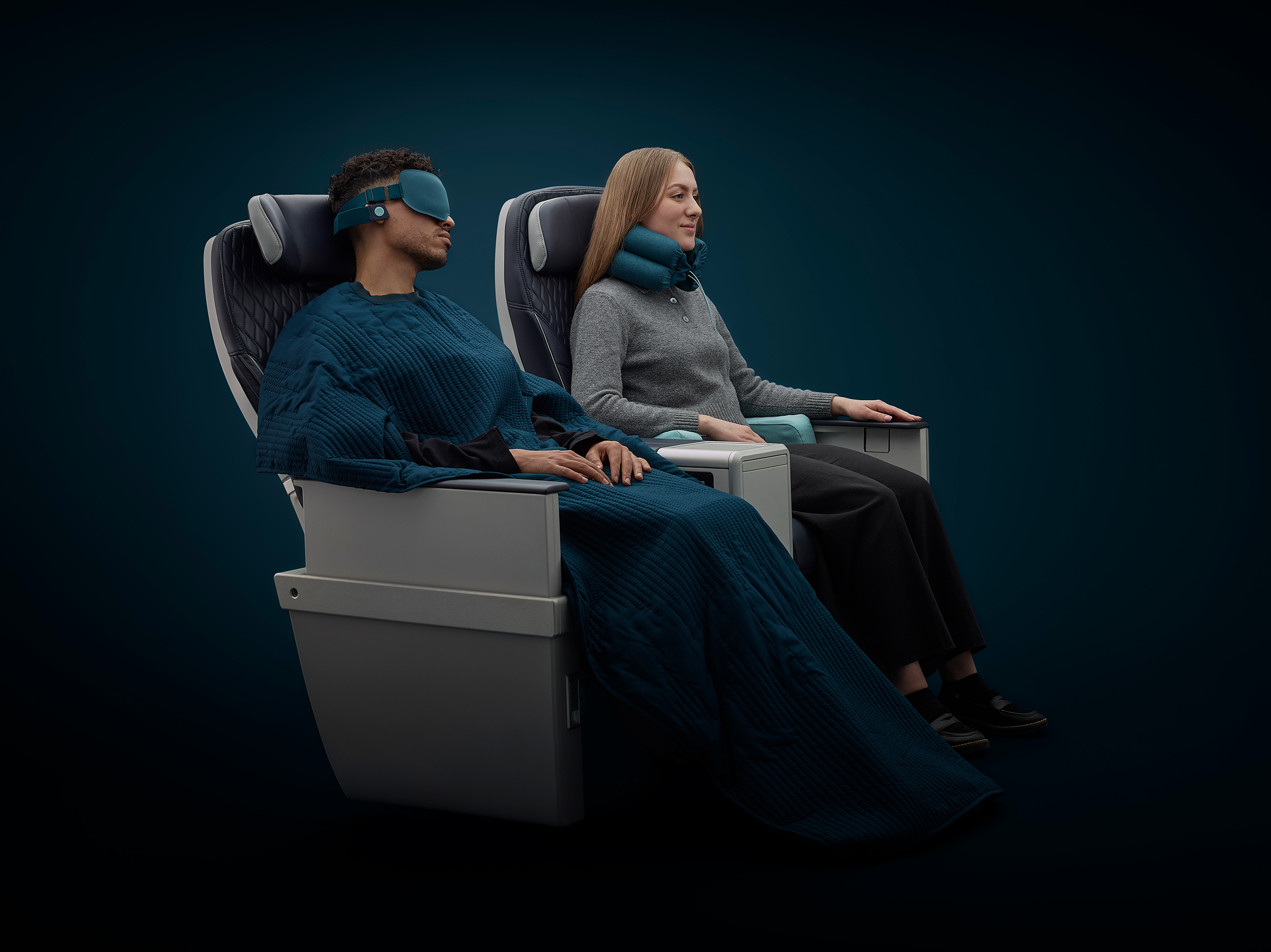 tangerine x buzz travel set consisting of blanket, eye mark, ear buds, neck pillow and lumbar cushion