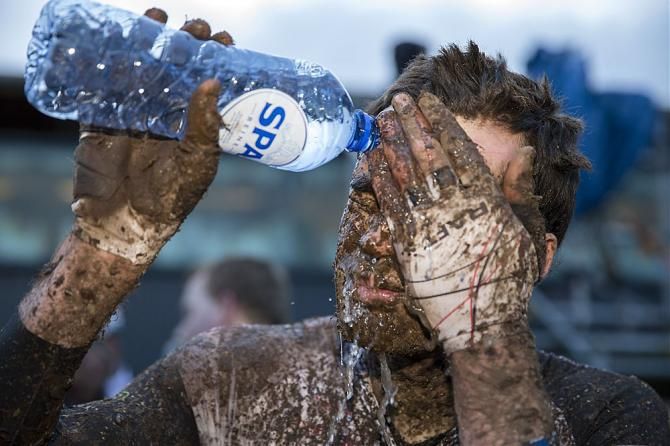Wietse Bosmans cleans up after the finish
