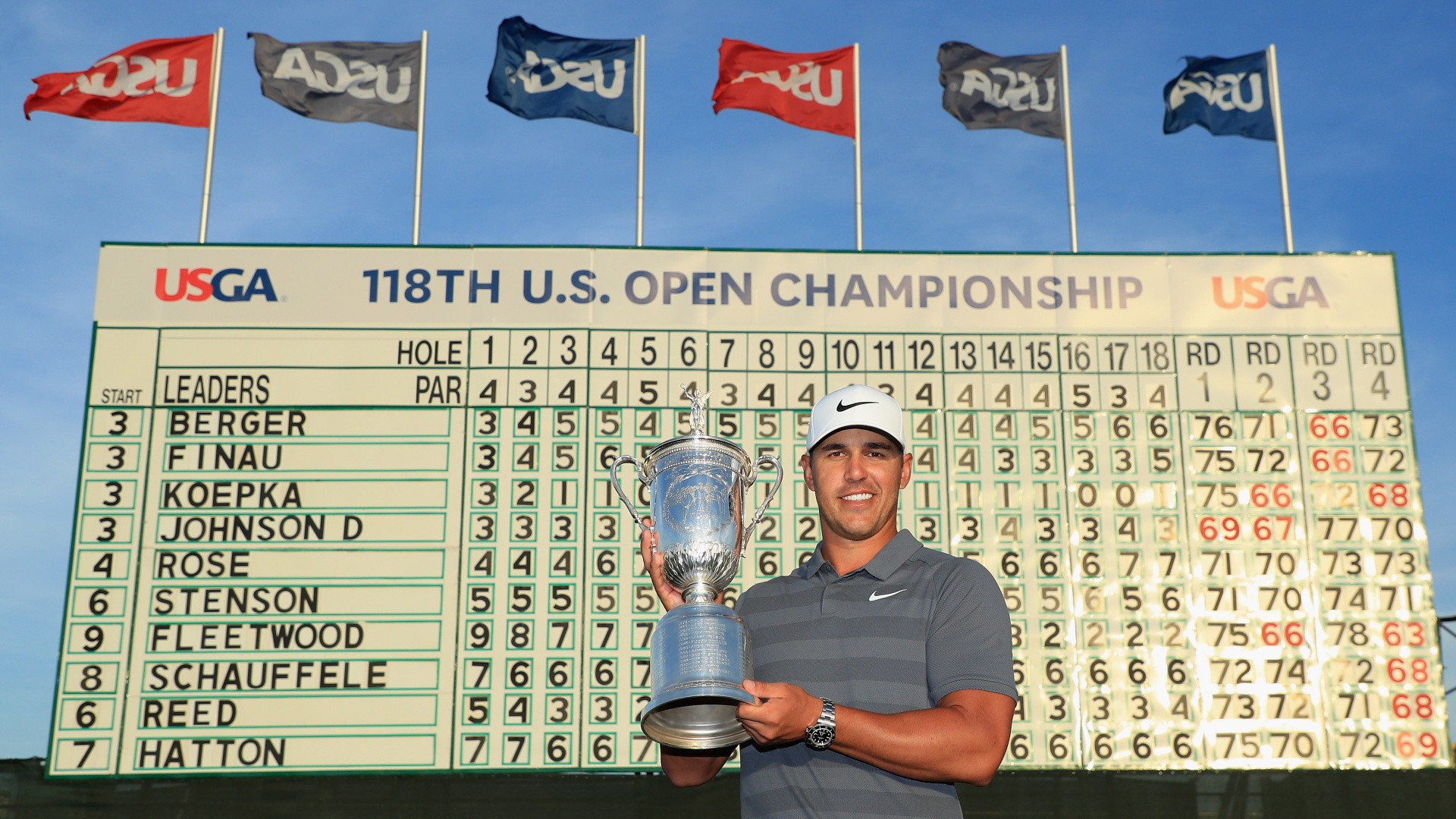 Brooks Koepka celebrates winning the 2018 US Open at Shinnecock Hills