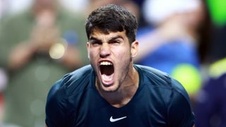 Defending US Open champion Carlos Alcaraz of Spain reacts by roaring at the crowd after winning a tennis match earlier this year.