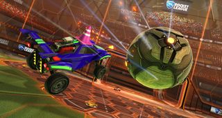 Local multiplayer games — a turbo-powered rocket car shuttles towards mid-air collision with the ball in Rocket League