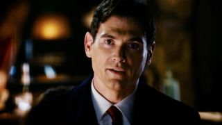 Billy Crudup sits in the middle of a conversation in Mission: Impossible III.