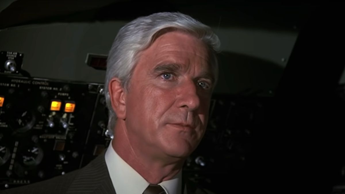 Leslie Nielsen standing in the cockpit in Airplane!