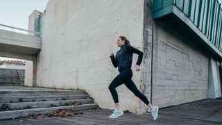 A woman running outdoors