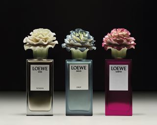 Three Loewe perfumes with Lladró porcelain bottle tops