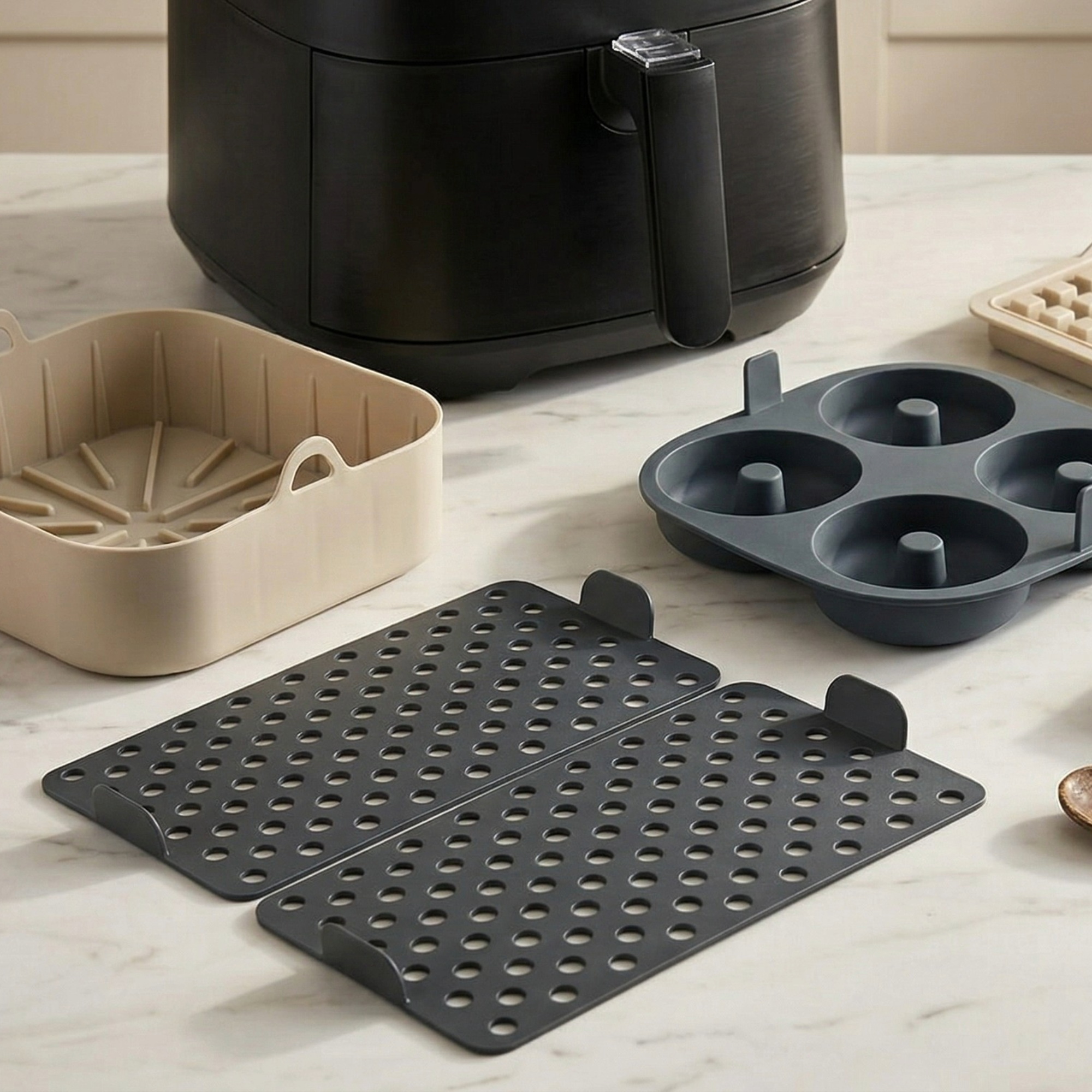 Gemini-generated image of Aldi's air fryer accessories on a marble kitchen worktop, next to an air fryer