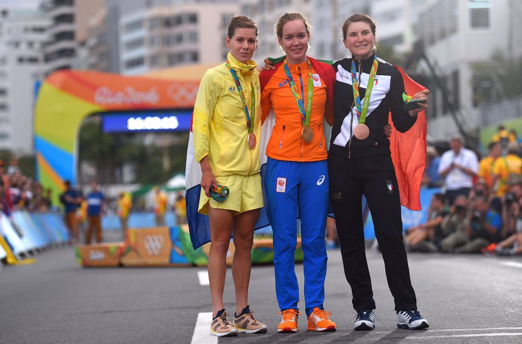 Smiles from the podium