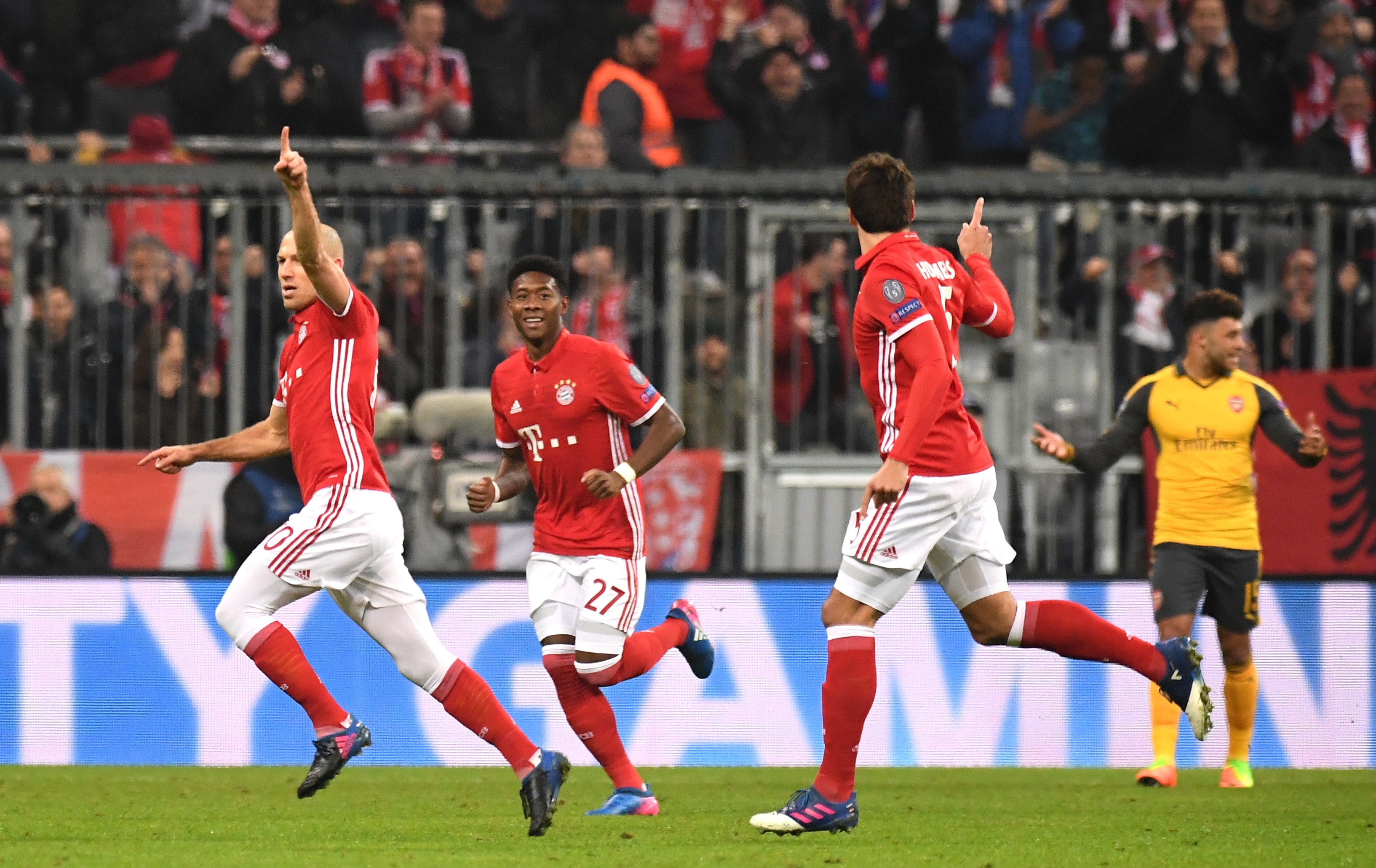 Arjen Robben, David Alaba and Mats Hummels celebrate a goal for Bayern Munich against Arsenal in the Champions League in February 2017.