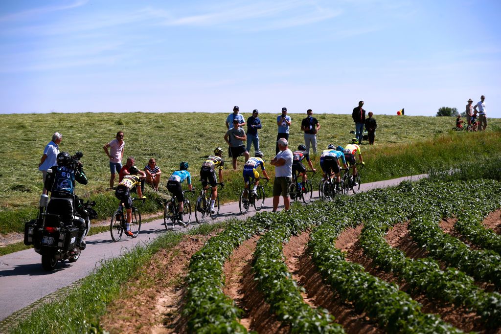 MAARKEDAL BELGIUM JUNE 09 Tom Wirtgen of Luxembourg and Team Bingoal WB Robbe Ghys of Belgium and Team Sport Vlaanderen Baloise Arne Marit of Belgium and Team Sport Vlaanderen Baloise Thijs Aerts of Belgium and Team Baloise Trek Lions Gianni Marchand of Belgium and Team Tarteletto Isorex Julien Van Den Brande of Belgium and Team Tarteletto Isorex Yoeri Havik of Netherlands and Team Beat Cycling Club Jan Willem Van Schip of Netherlands and Team Beat Cycling Club in breakaway during the 90th Baloise Belgium Tour 2021 Stage 1 a 1753km stage from Beveren to Maarkedal Public Fans baloisebelgiumtour on June 09 2021 in Maarkedal Belgium Photo by Bas CzerwinskiGetty Images