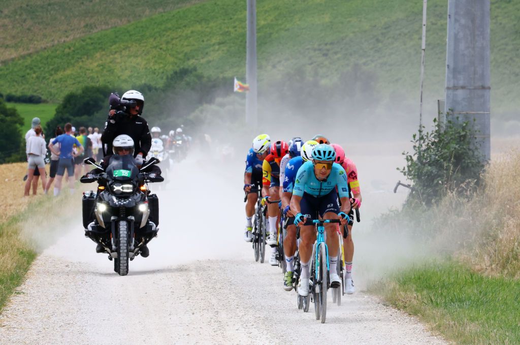TROYES FRANCE JULY 07 Alexey Lutsenko of Kazakhstan and Astana Qazaqstan Team competes in the breakaway passing through a gravel strokes sector during the 111th Tour de France 2024 Stage 9 a 199km stage from Troyes to Troyes UCIWT on July 07 2024 in Troyes France Photo by Etienne Garnier PoolGetty Images