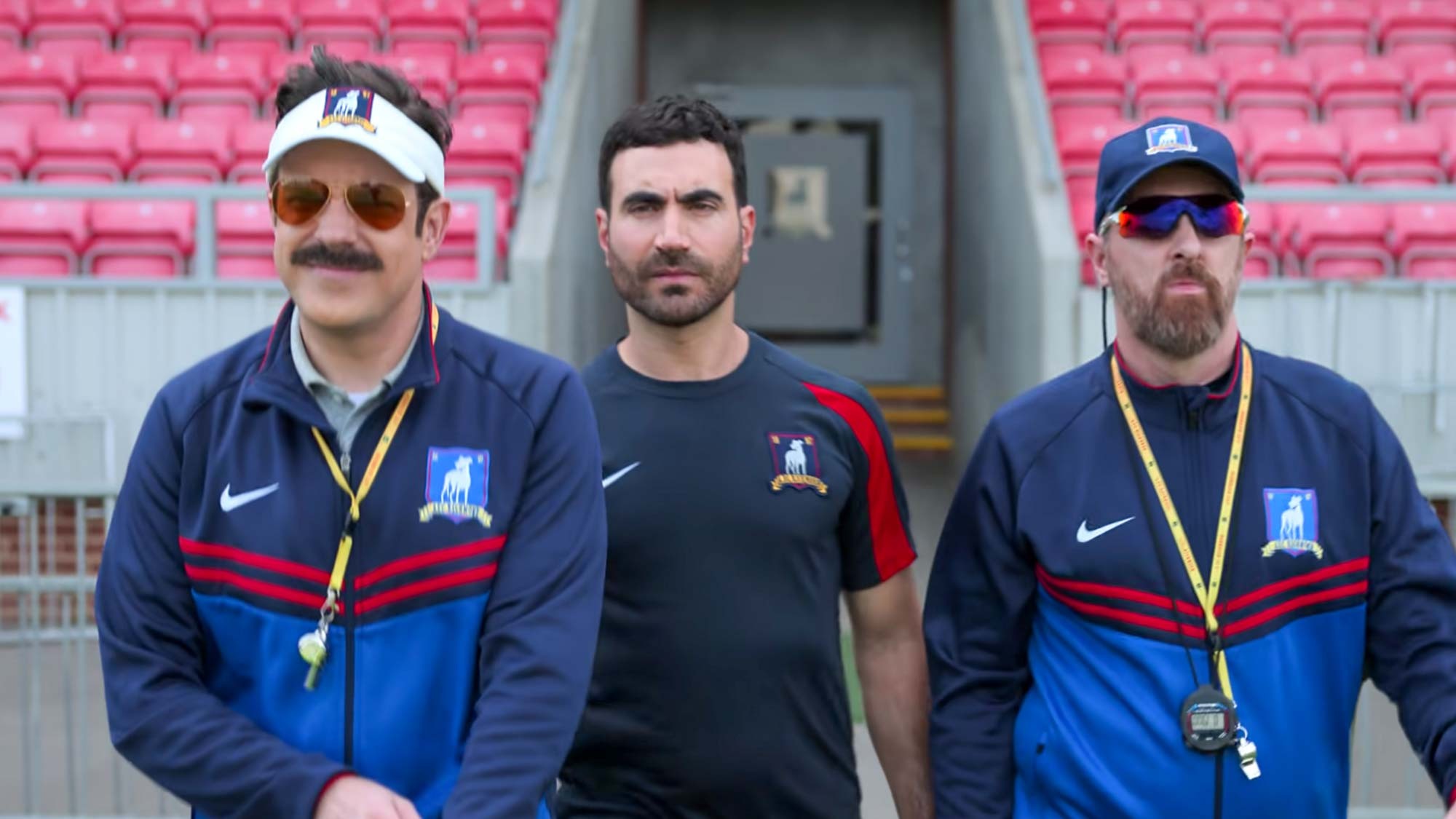(L to R) Jason Sudeikis as Ted Lasso, Brett Goldstein as Roy Kent and Brendan Hunt as Coach Beard in Ted Lasso season 3's trailer