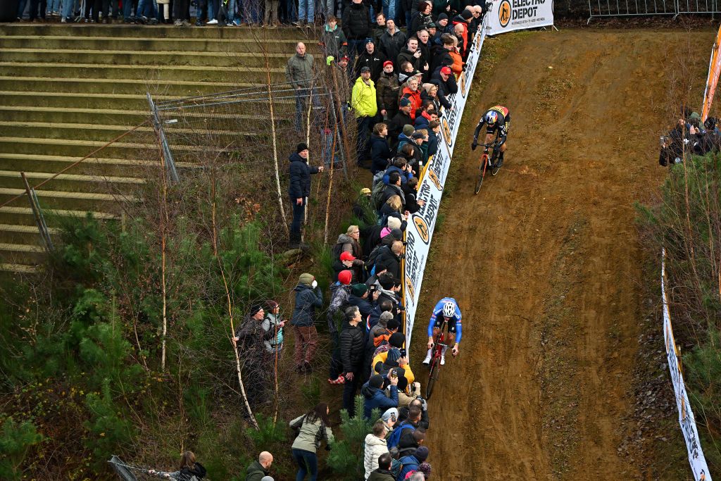 ZOLDER BELGIUM DECEMBER 27 Mathieu Van Der Poel of The Netherlands and Team AlpecinDeceuninck and Wout Van Aert of Belgium and Team JumboVisma lead the breakaway during the 18th Superprestige HeusdenZolder 2022 Mens Elite Superprestige2023 on December 27 2022 in Zolder Belgium Photo by Luc ClaessenGetty Images