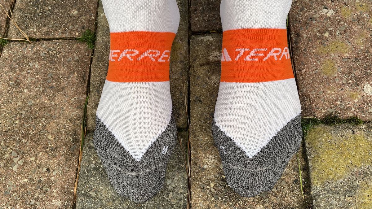 adidas Terrex Heat.Rdy Trail Running Speed Ankle Socks being worn (without shoes) on paving